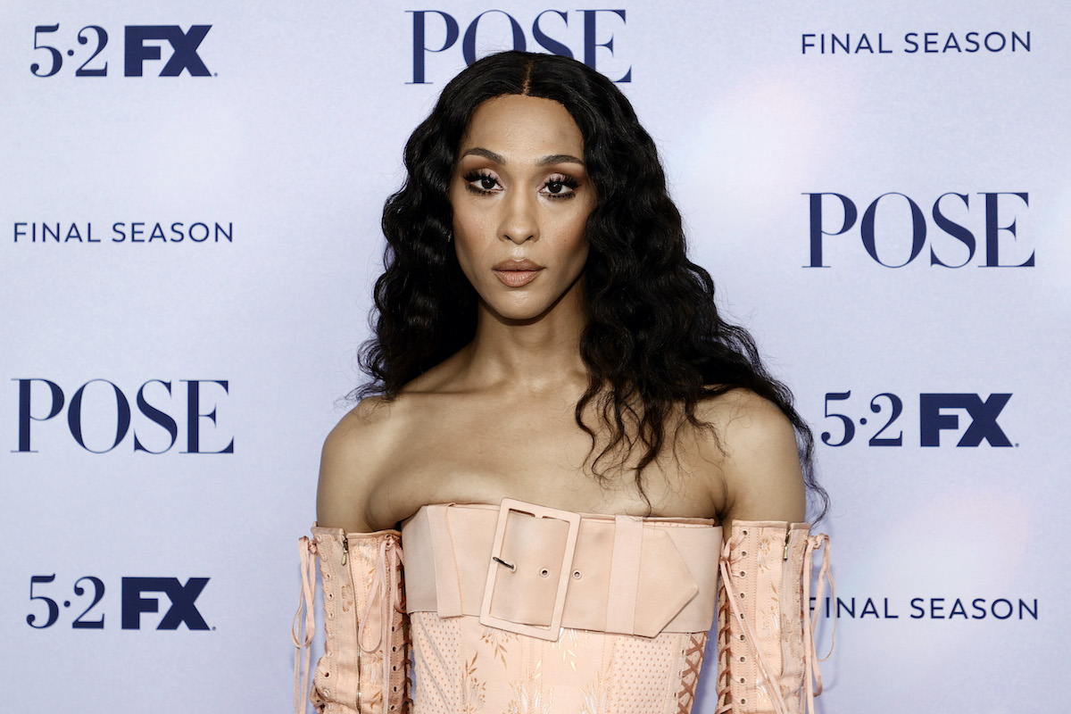 Mj Rodriguez wears a light-colored outfit at a TV event