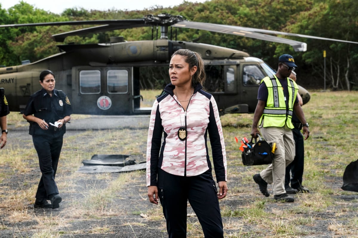 NCIS: Hawai'i -- Vanessa Lachey stands in front of a helicopter