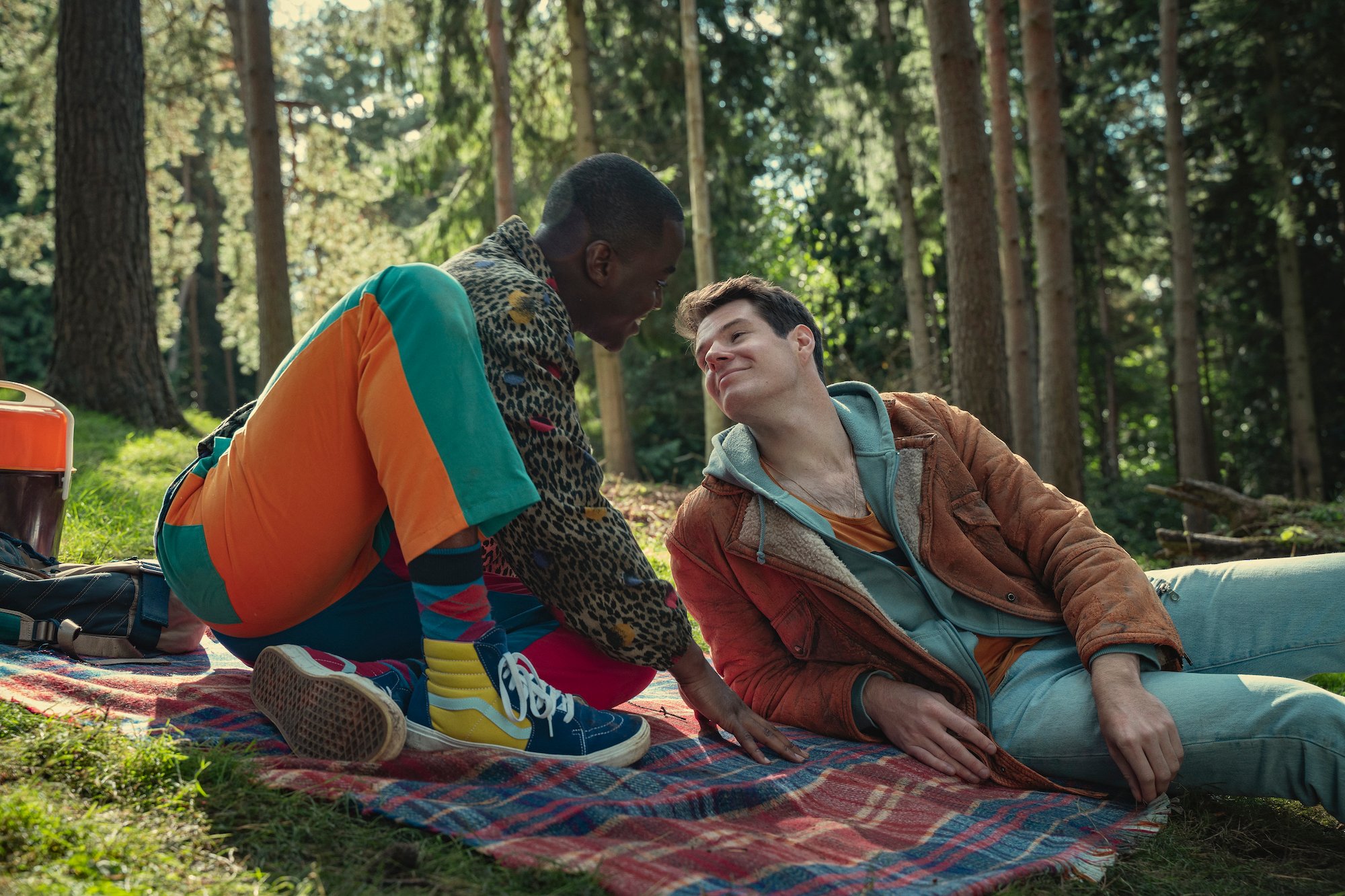 Ncuti Gatwa, and Connor Swindells having a picnic in 'Sex Education' Season 3
