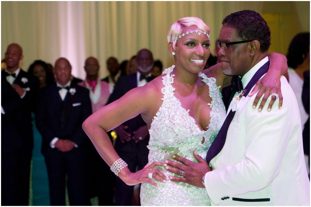 'RHOA' alum NeNe Leakes hugging her husband, Gregg Leakes, on their wedding day.