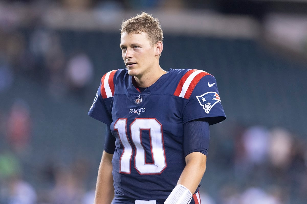 New England Patriots quarterback Mac Jones dressed in full pads for preseason game