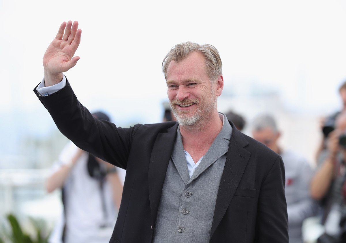 Christopher Nolan waving hello to a crowd