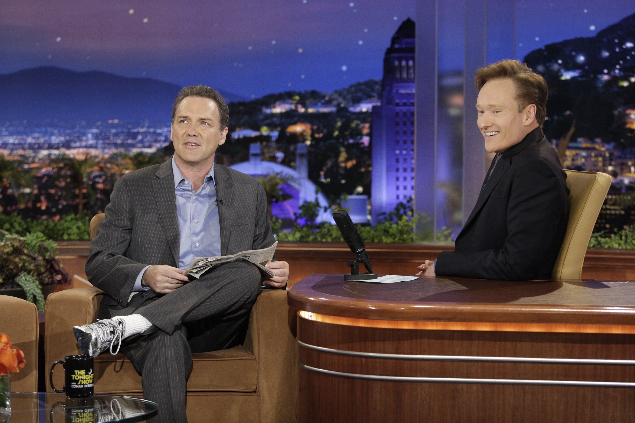 Norm Macdonald talking to Conan O'Brien. Norm Macdonald's wife and son come up in conversation during late-night shows.