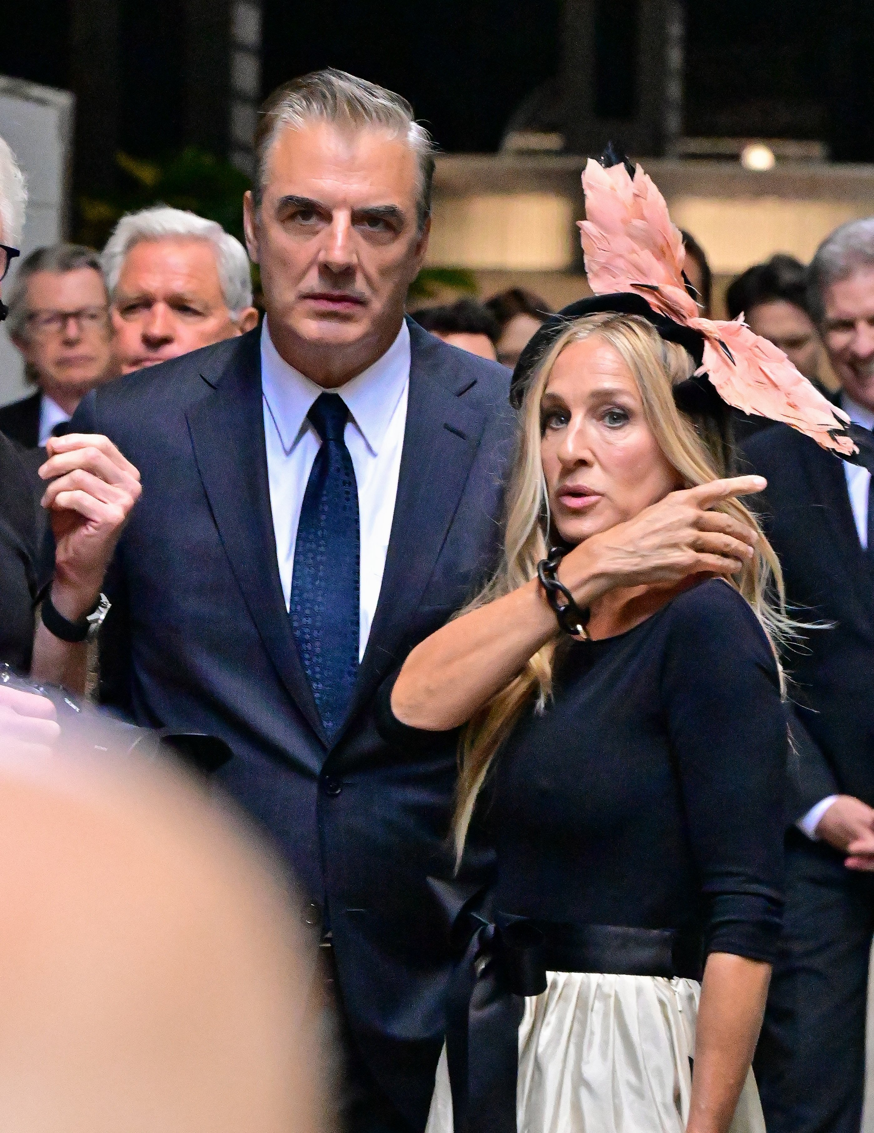 Iconic on-screen couple, Carrie Bradshaw and Mr. Big are surrounded by a crowd during the filming of 'And Just Like That...' the upcoming 'Sex and the City' Reboot