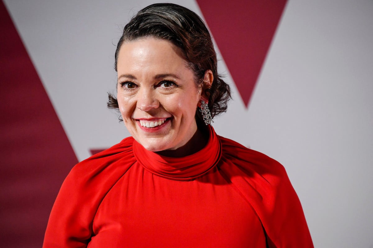 Olivia Colman on the red carpet in a red dress