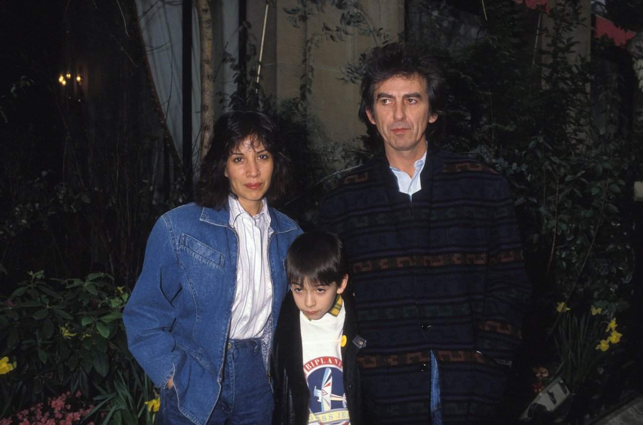 Olivia, Dhani, and George Harrison in Paris in 1988.