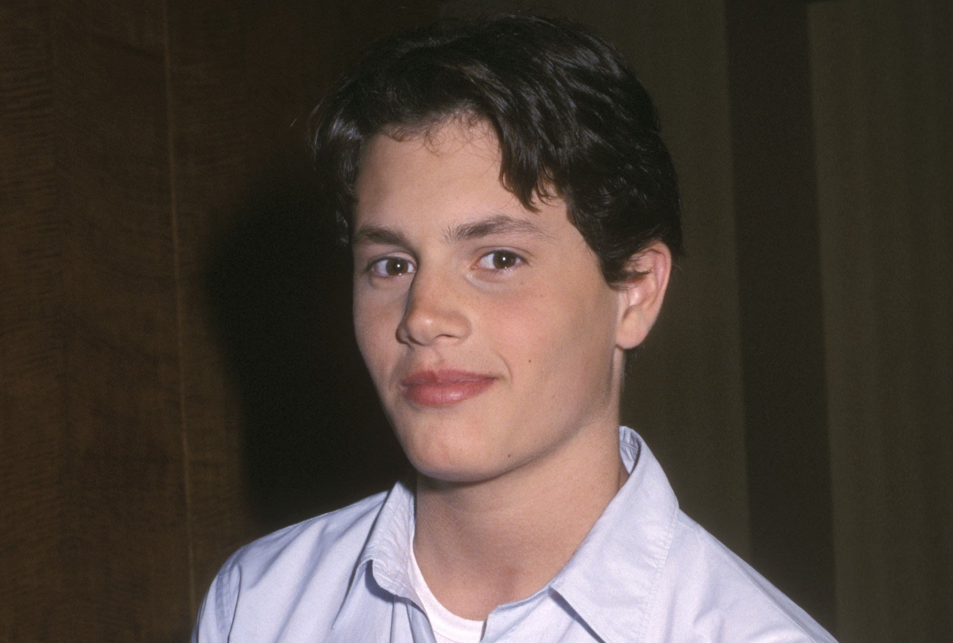 Penn Badgley in a white shirt in 2002.