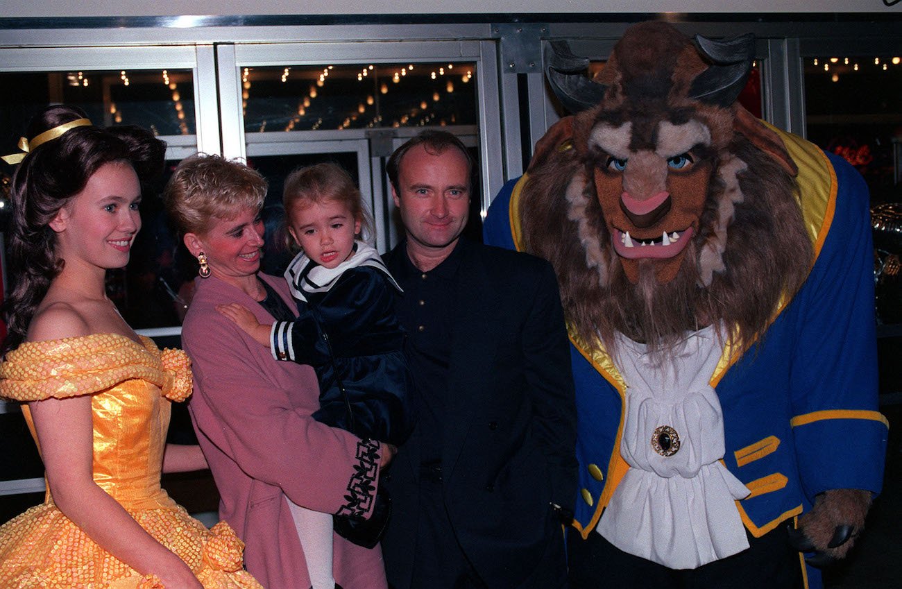 Phil Collins, his wife Jill, and their daughter Lily Collins, at the premiere of 'Beauty and the Beast.'