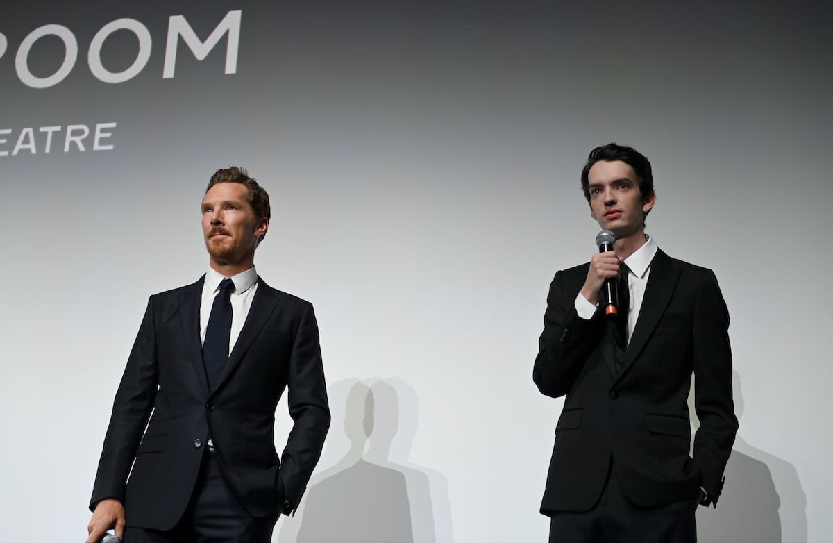 Benedict Cumberbatch (L) and Kodi Smit-McPhee speak onstage during Netflix's 'Power Of The Dog' screening during the Toronto International Film Festival at the Princess of Wales Theatre on September 10, 2021 in Toronto, Ontario. They recently chatted about the differences between superhero and novel adaptations