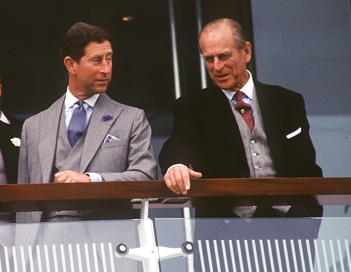 Prince Charles with his father, Prince Philip, enjoying a day of horse racing together at the derby