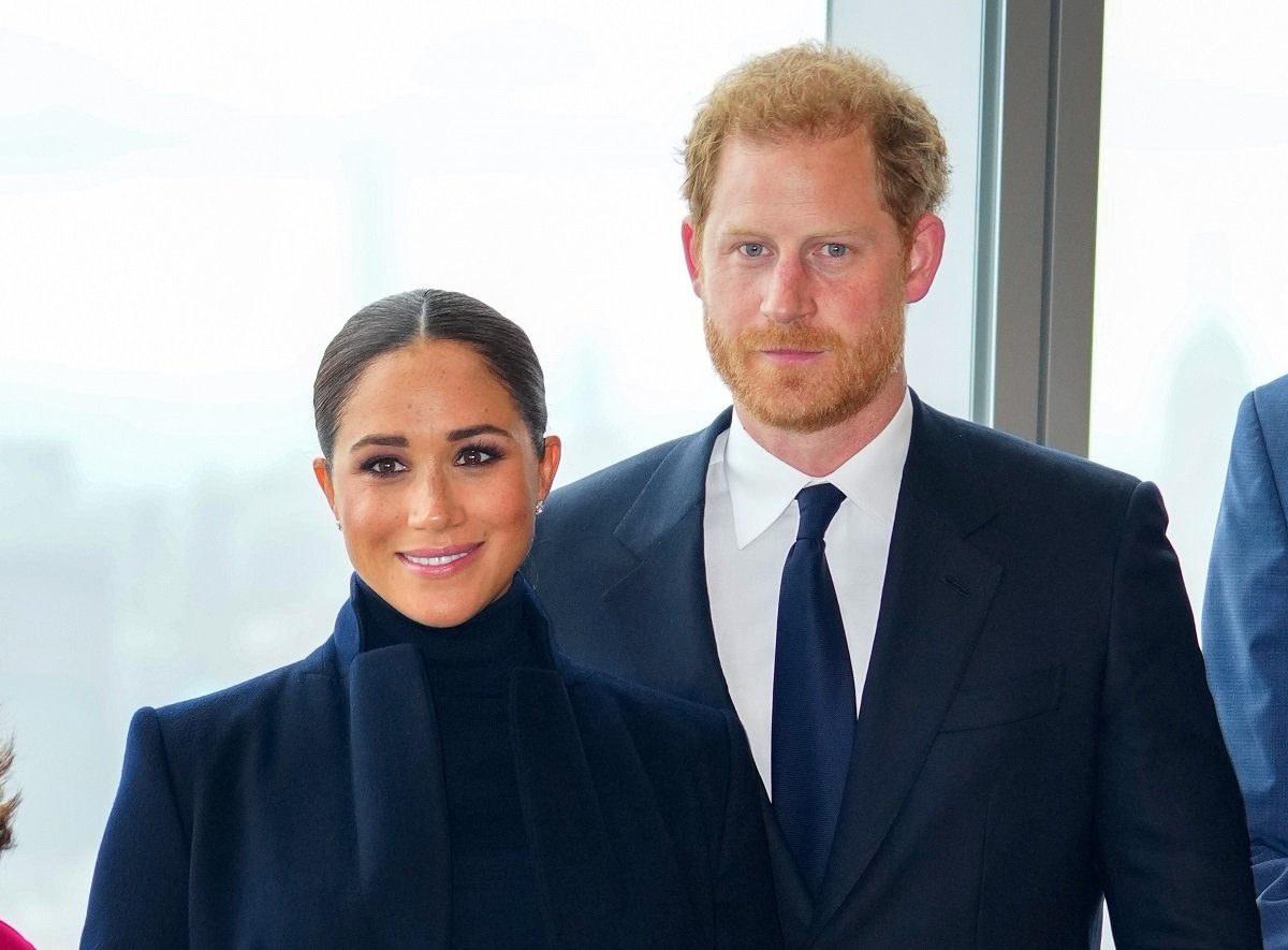 Prince Harry and Meghan Markle pose for a photo during visit to 1 World Trade Center in NYC