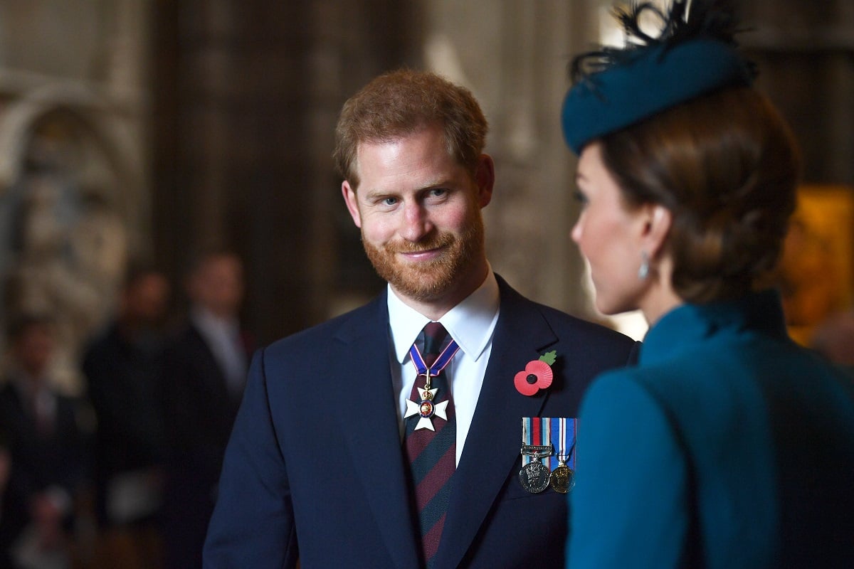 Prince Harry smiling at Kate Middleton during the ANZAC Day Service of Commemoration and Thanksgiving