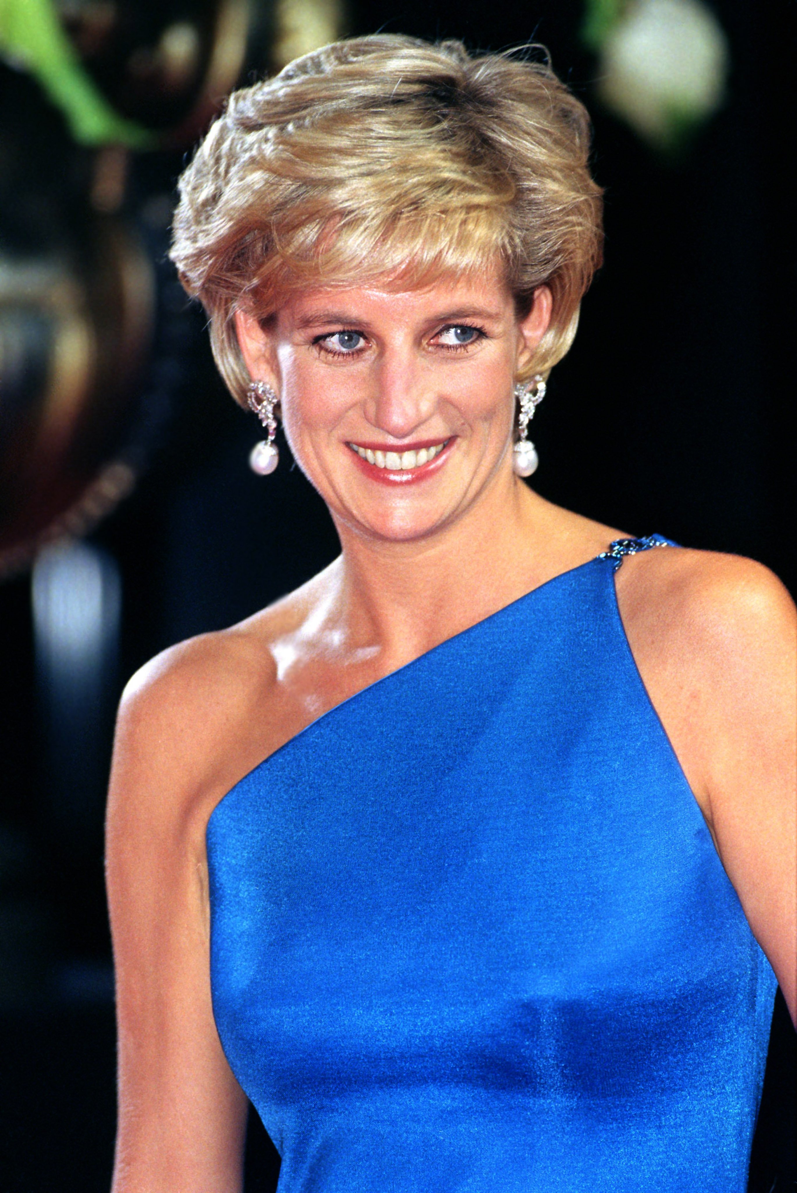 Princess Diana wearing a bright blue gown to The Victor Chang Research Institute Dinner Dance