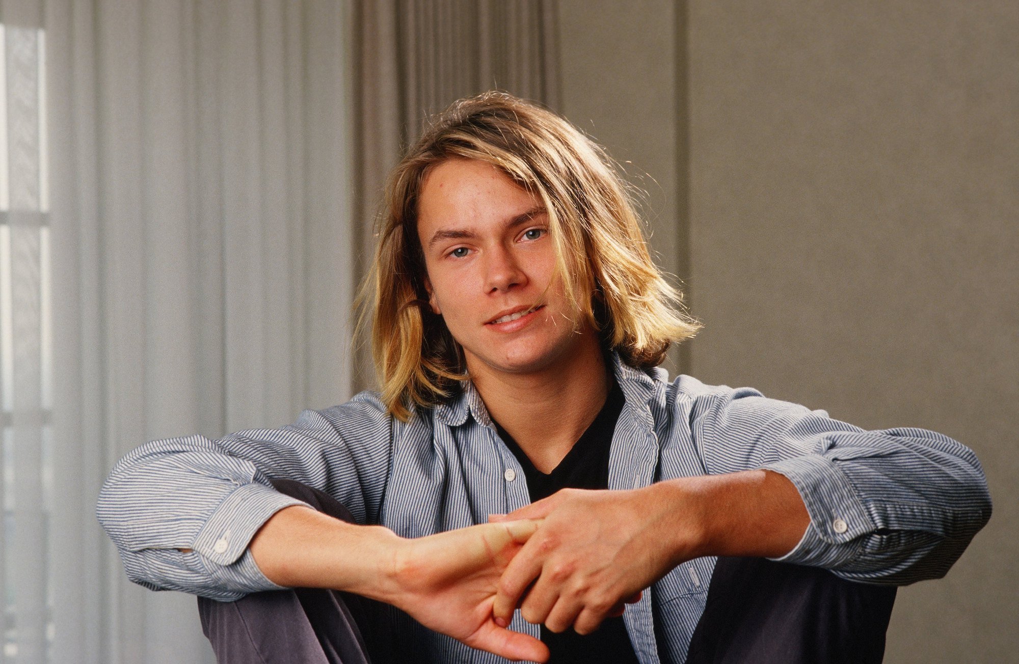 River Phoenix smiling