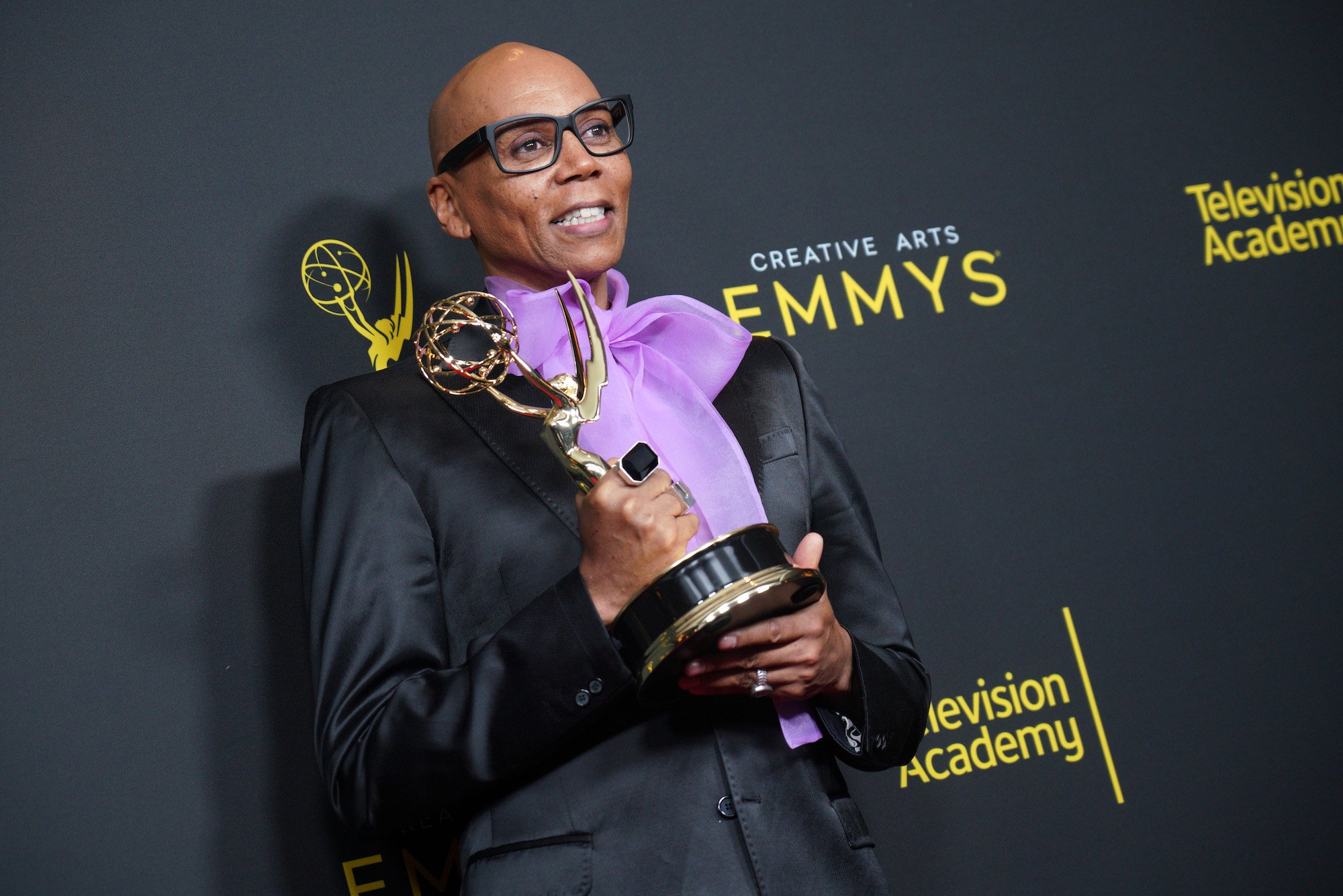 'RuPaul's Drag Race' host RuPaul Charles posing with an Emmy at the 2019 Emmy Awards