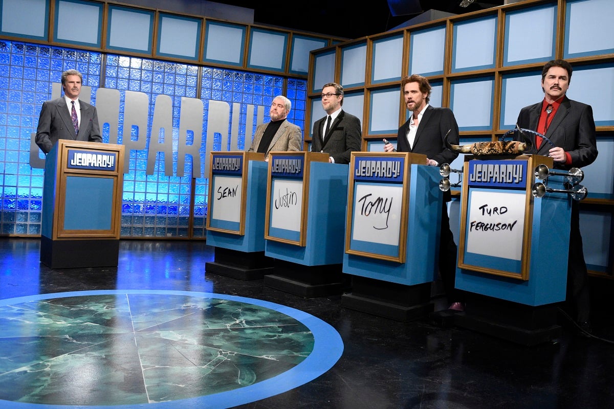 Will Ferrell, Darrell Hammond, Taran Killam, Jim Carrey, and Norm Macdonald looking at the camera during a 'Saturday Night Live' skit.