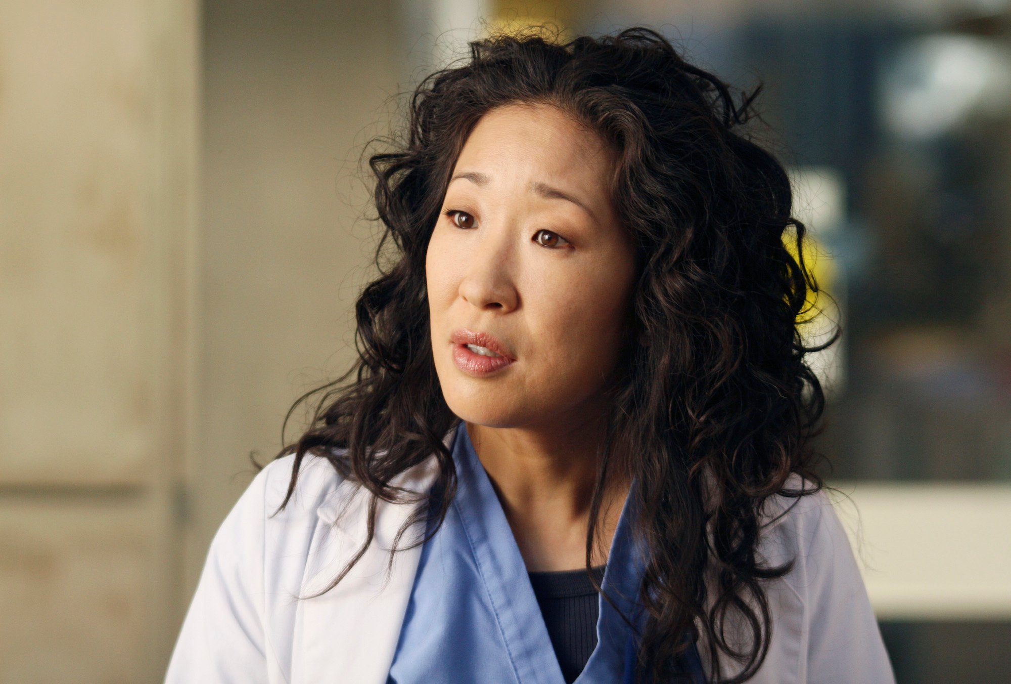 Sandra Oh wearing white scrubs in 'Grey's Anatomy.'