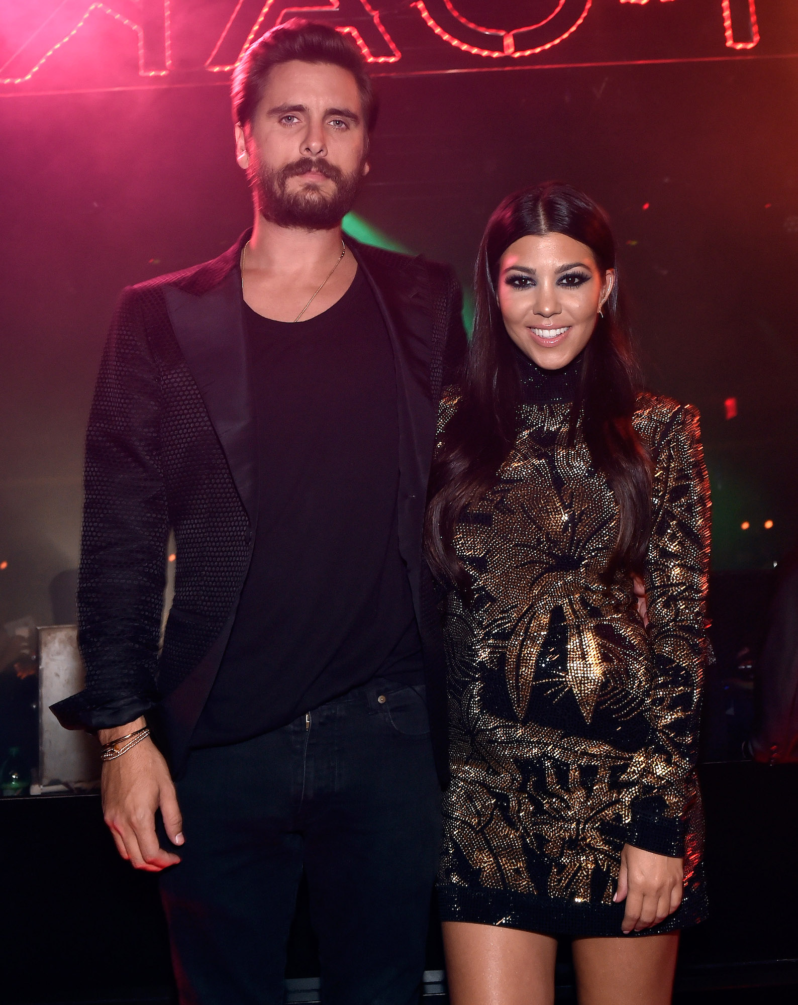 Scott Disick and Kourtney Kardashian posing at his birthday celebration in Los Vegas in 2015