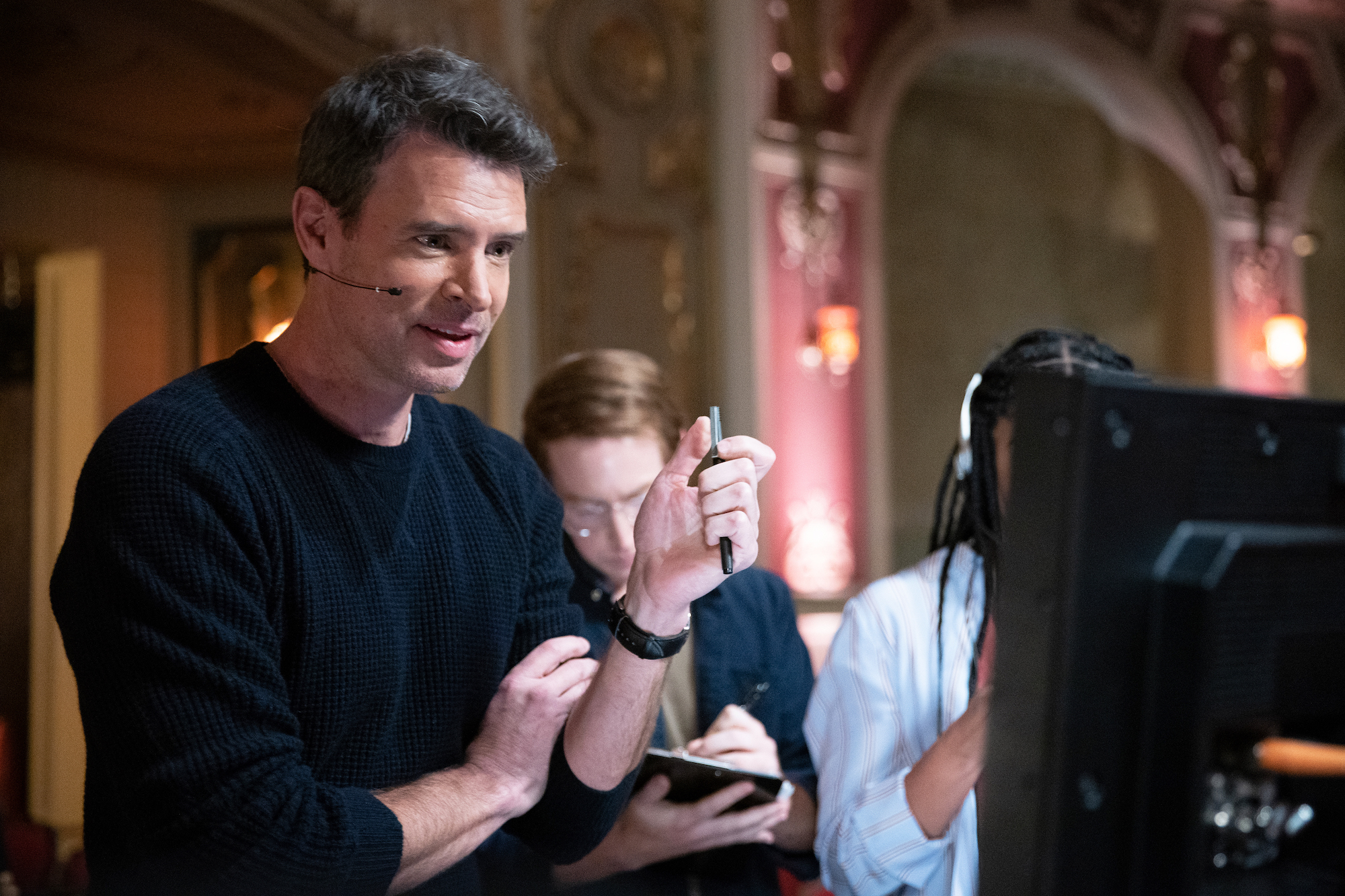 Scott Foley watches a monitor in The Big Leap