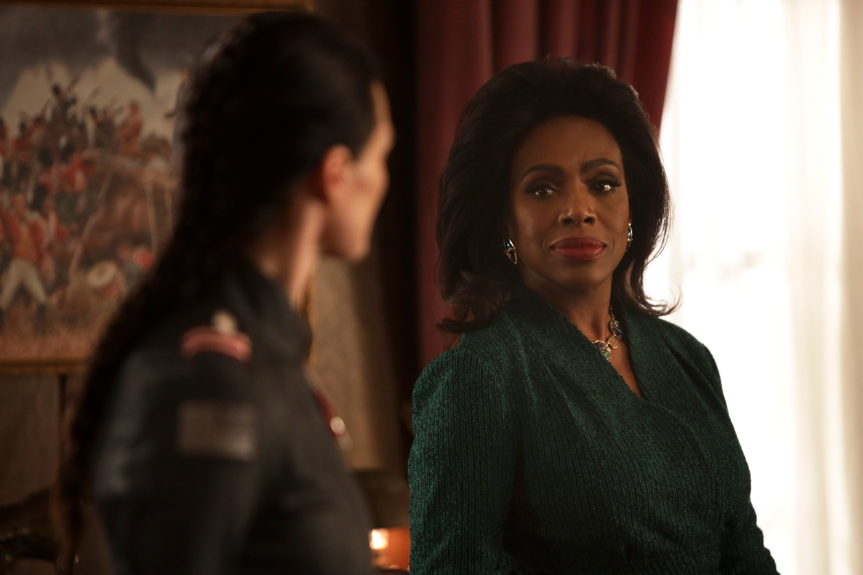 Sheryl Lee Ralph in 'Motherland: Fort Salem' as President Kelly Wade looking at Alder