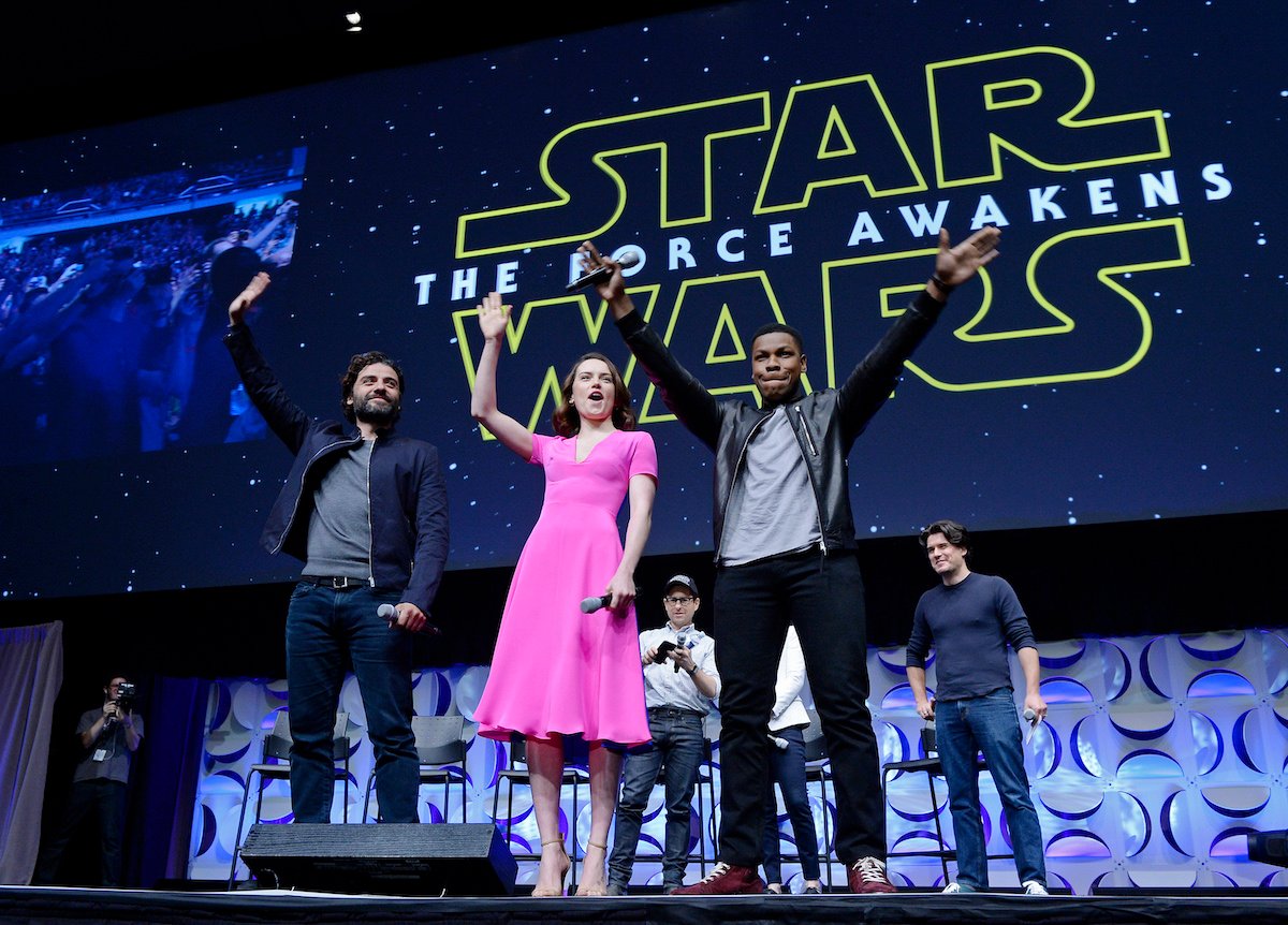Cast members (L -R) Oscar Isaac, Daisy Ridley, John Boyega of 'Star Wars: The Force Awakens.' 