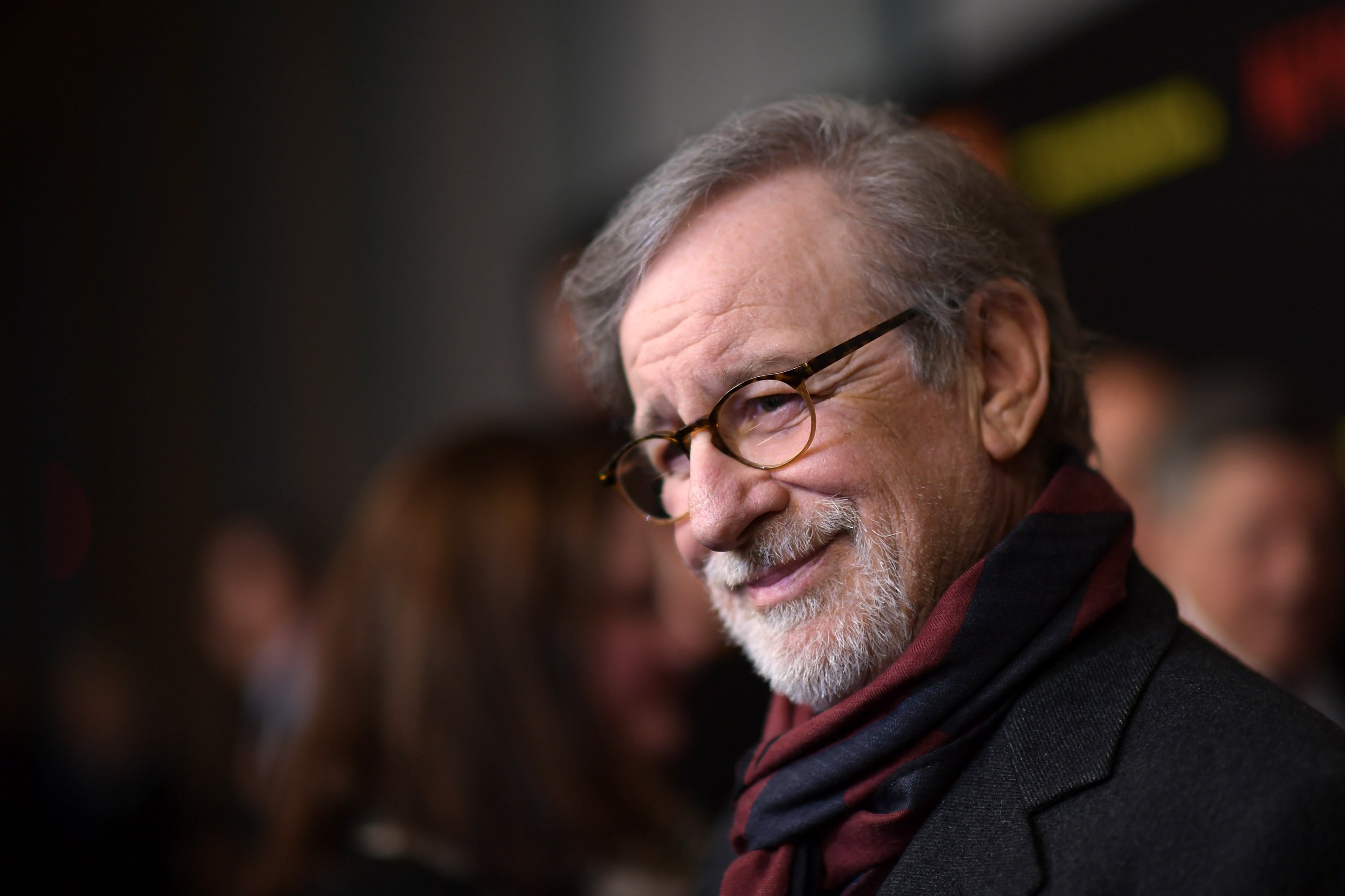 Steven Spielberg hasn't directed a musical before 'West Side Story' and poses at a premiere for the cameras