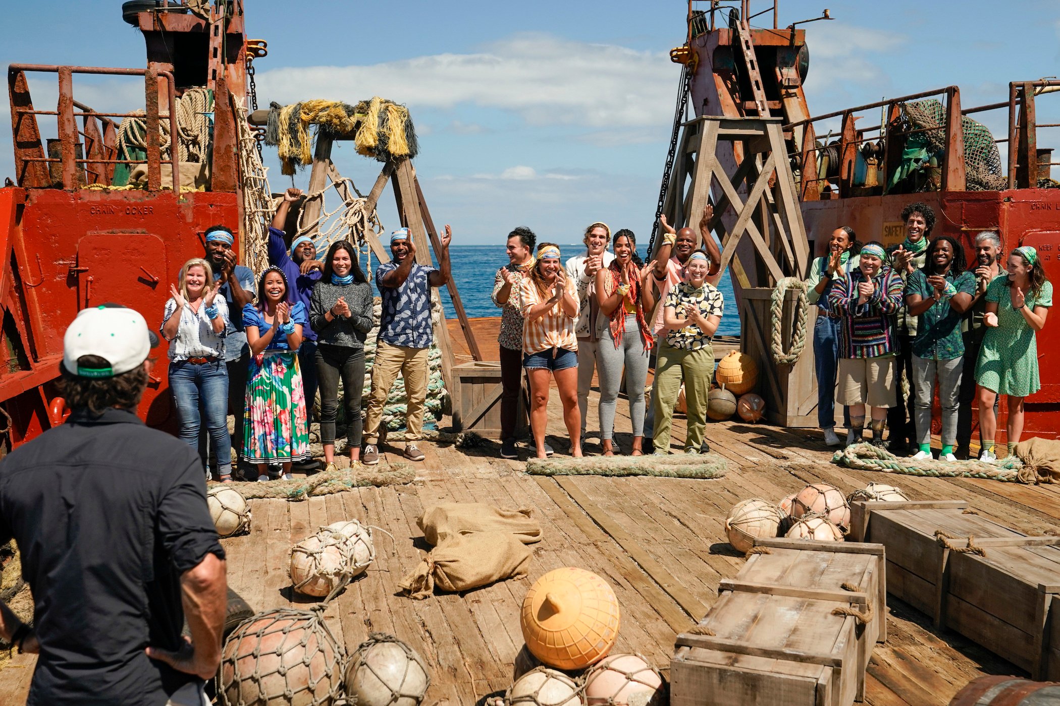 Jeff Probst and the 'Survivor' tribes on a boat from the 'Survivor' Season 41 premiere