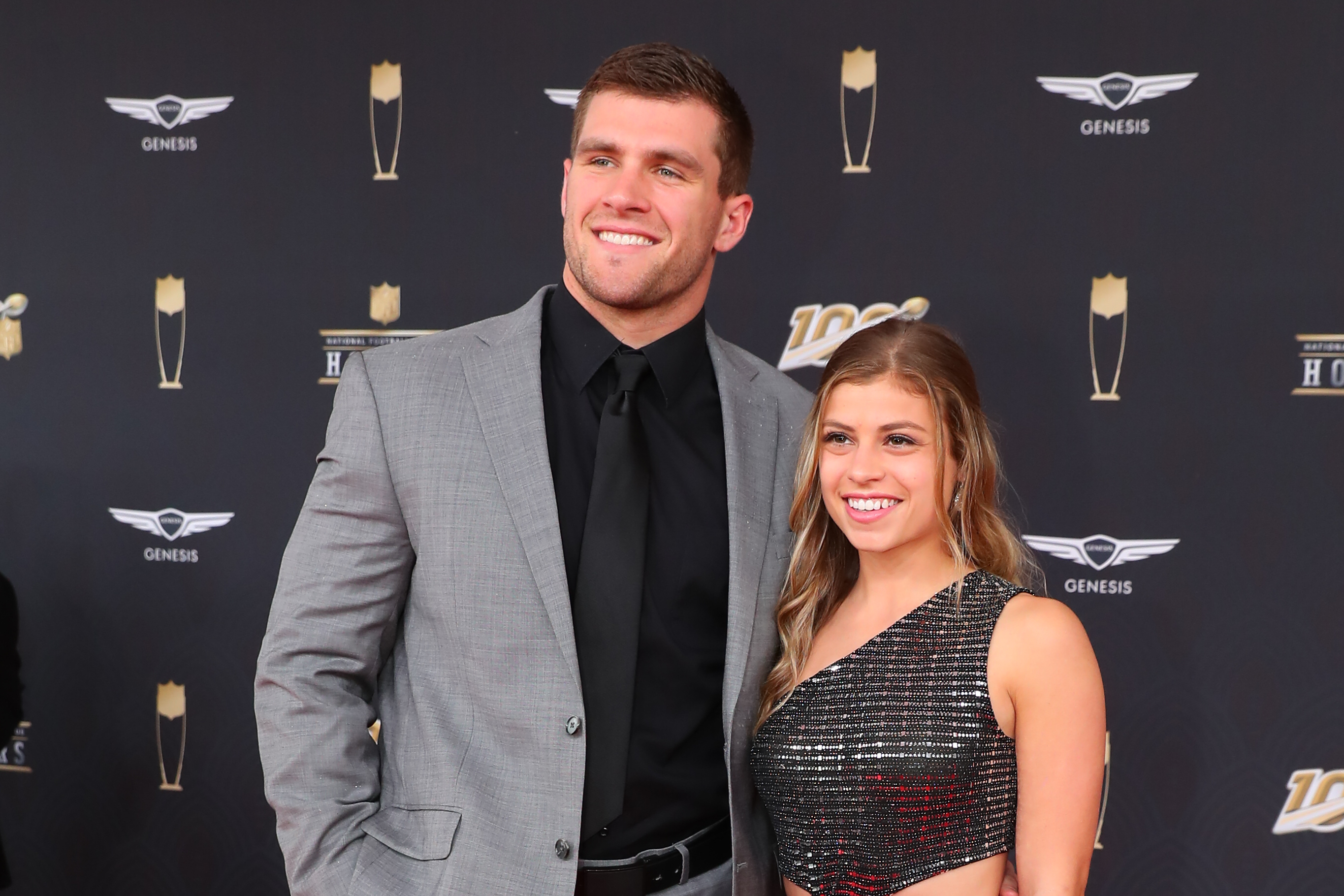 T.J. Watt and Dani Rhodes pose together on the red carpet prior to the NFL Honors