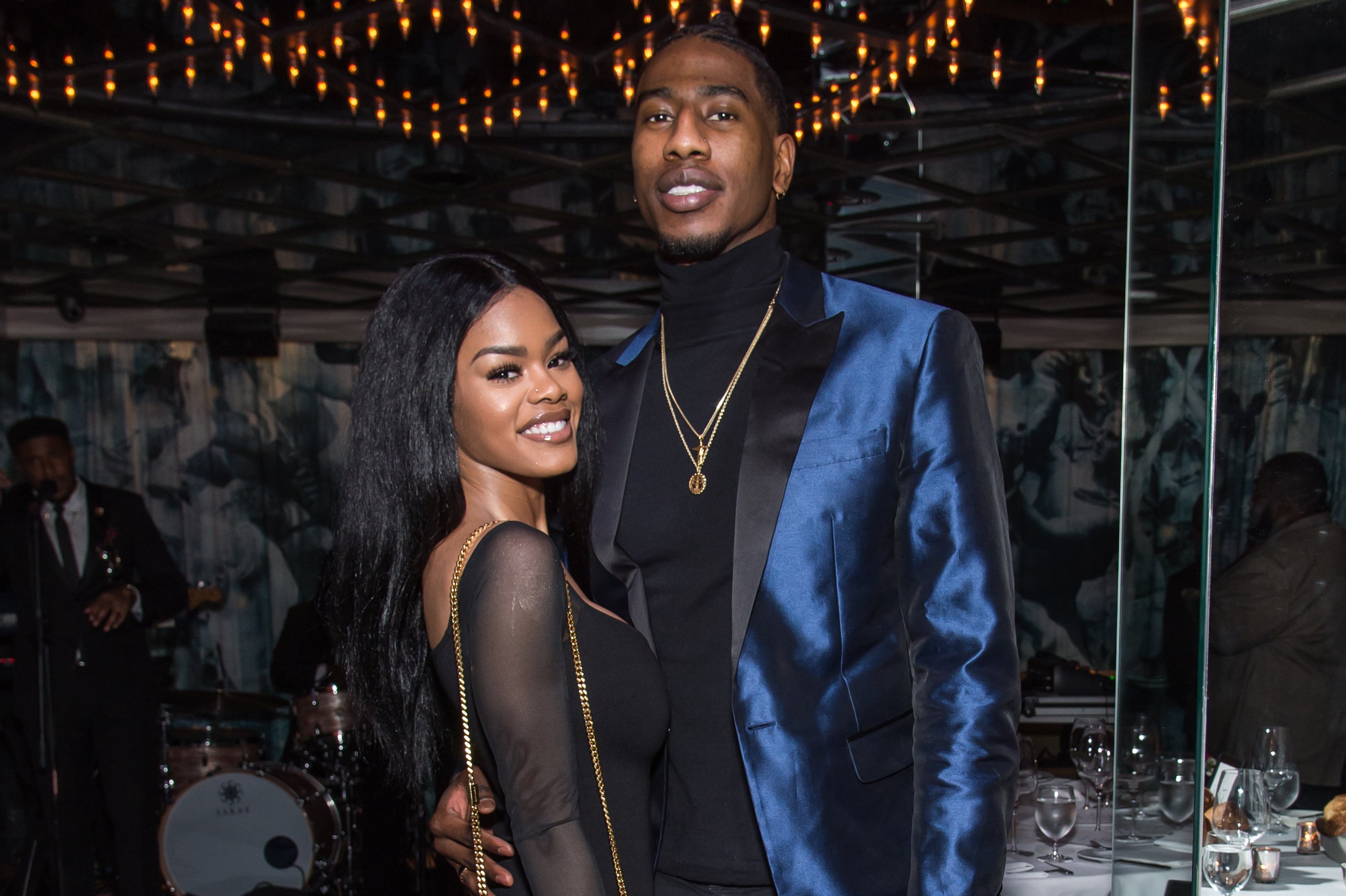 Teyana Taylor and Iman Shumpert pose for photo together at a Forbes dinner party