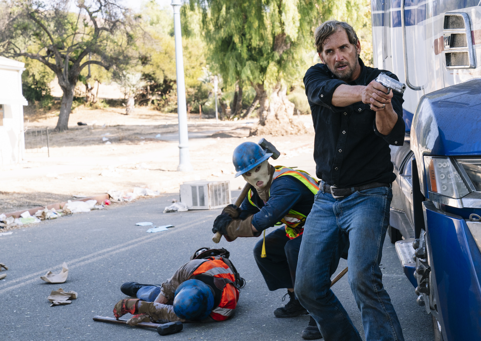 Josh Lucas points a gun in The Forever Purge