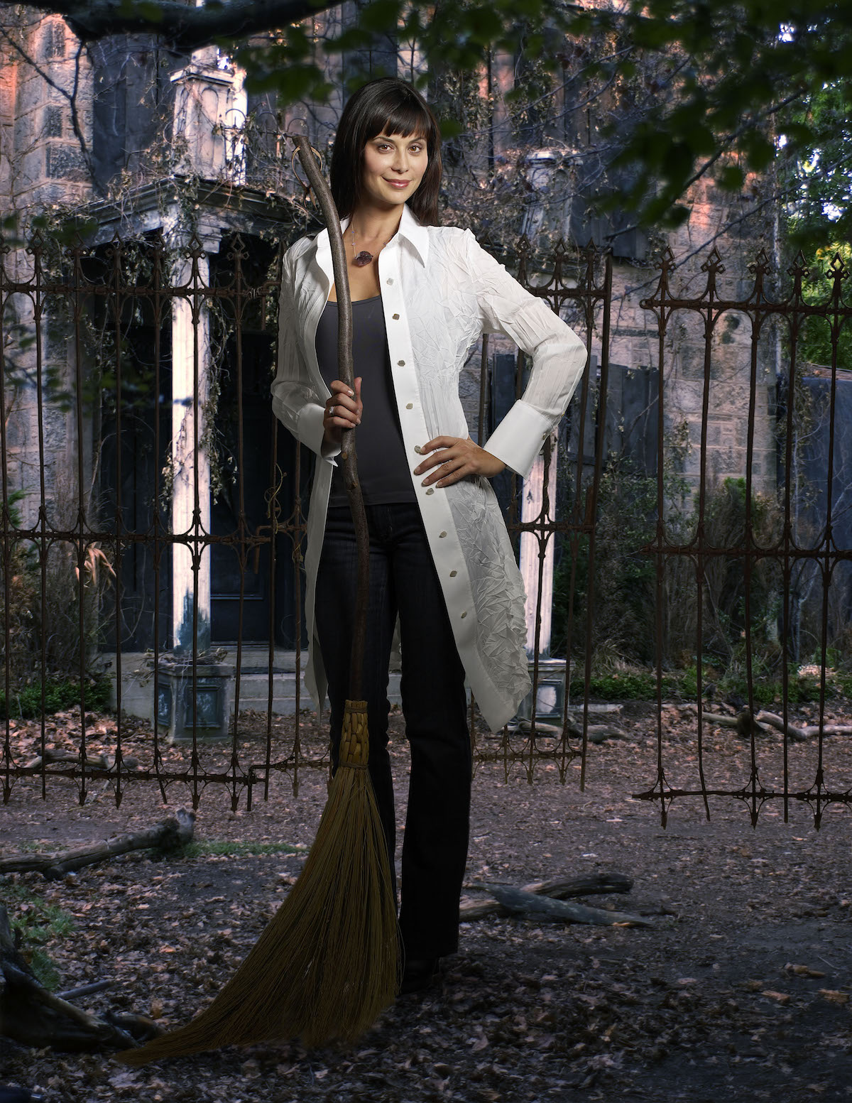 Catherine Bell as Cassie Nightingale, holding a broom, in 'The Good Witch'