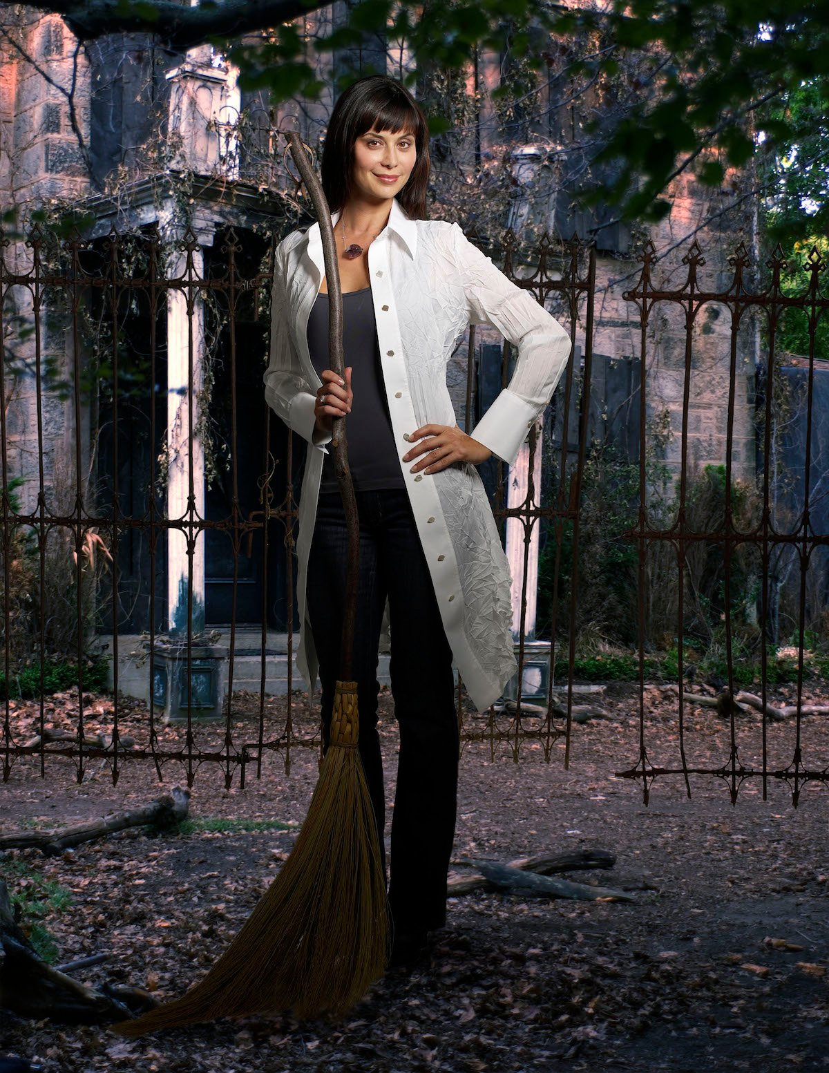 Catherine Bell as Cassie Nightingale, holding a broom, in 'The Good Witch'