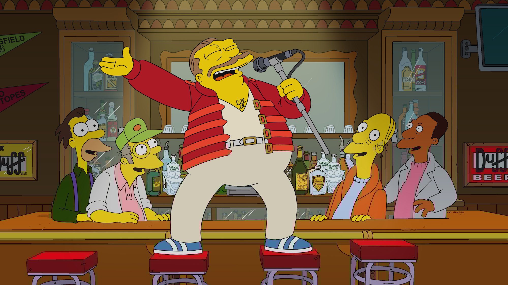 The Simpsons Season 33 premiere: Barney sings on barstools as Freddie Mercury