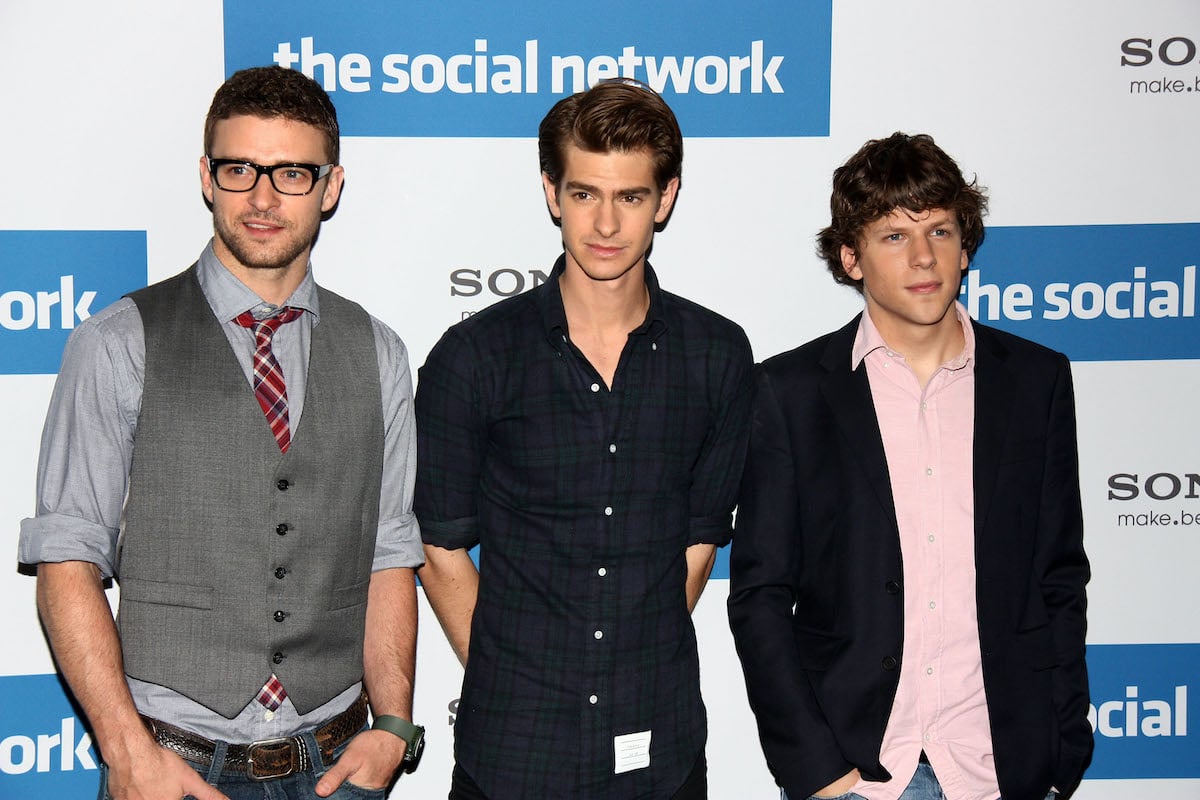 Justin Timberlake, Andrew Garfield, and Jesse Eisenberg attend a photocall to promote the film 'The Social Network' in October 2010. Garfield played Eduardo Saverin in 'The Social Network,' which started filming in October 2009. He recently revealed that he attended a Golden Globes party while filming, but he stayed in character that weekend and it affected his attitude at the event, leading to him getting into an 'altercation' with a couple.