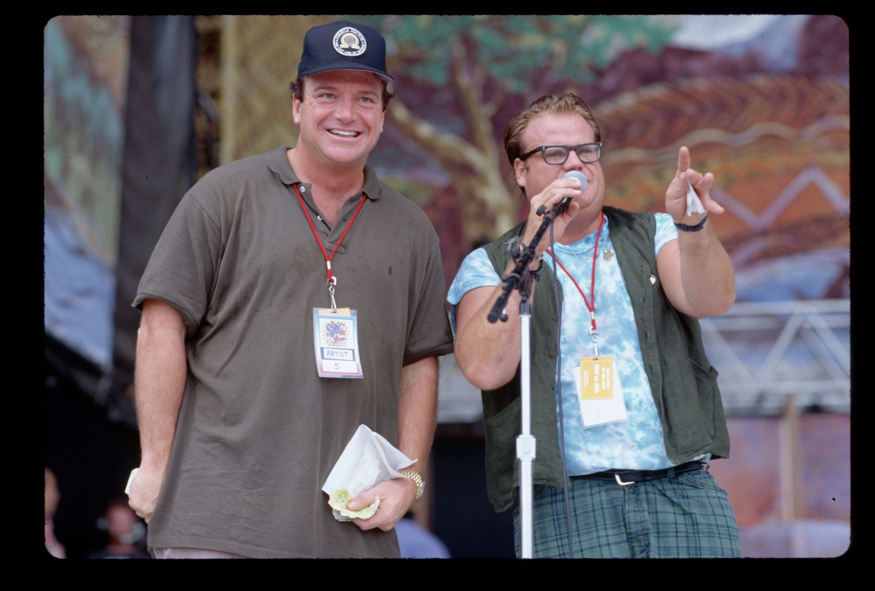 Tom Arnold and Chris Farley at the 25th Anniversary concert of Woodstock