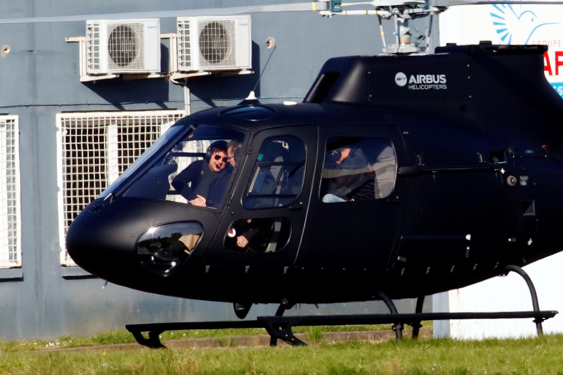 Tom Cruise in a helicopter arriving in Paris, France