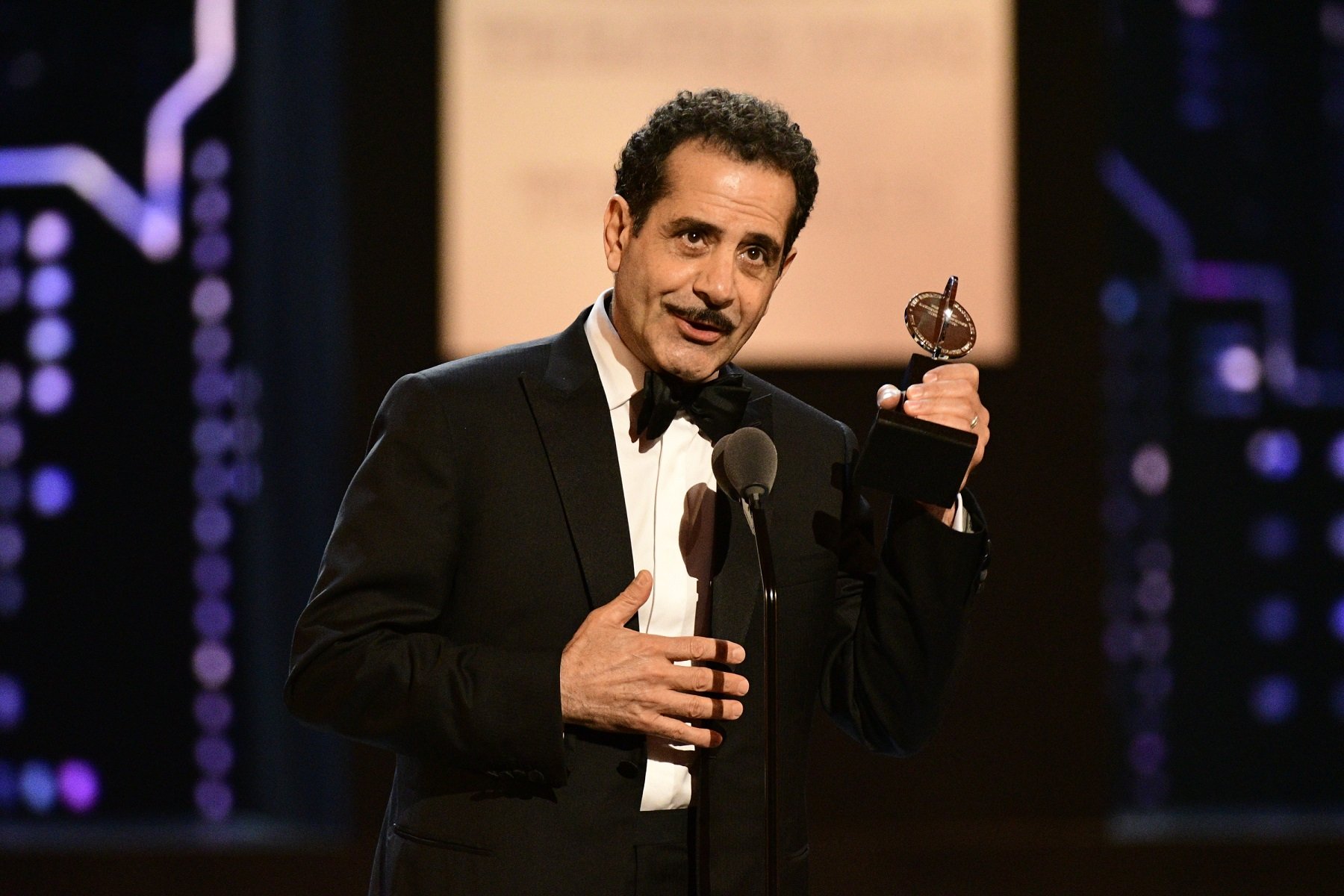 Tony Shalhoub on stage at the 2018 Tony Awards accepting an award for 'The Band's Visit'