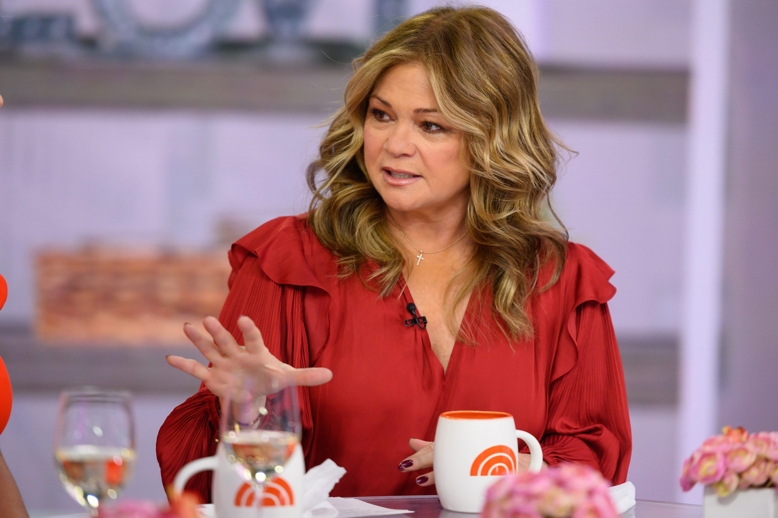 Valerie Bertinelli wears a red shirt