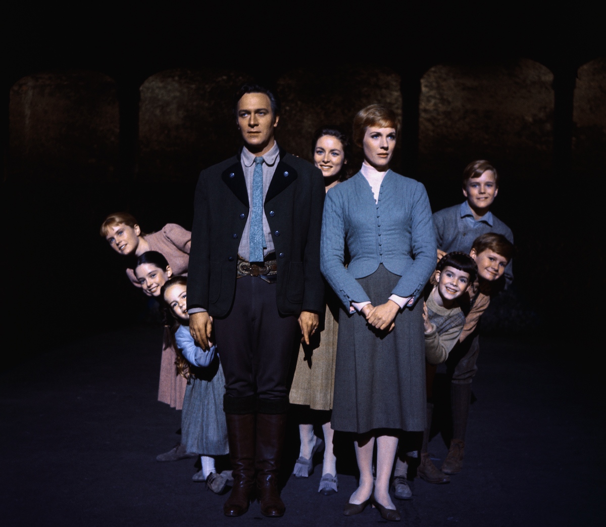 Julie Andrews and Christopher Plummer are flanked on all sides by their children, all members of the singing Von Trapp family, in this publicity handout from the 1965 adaption of the Rodgers and Hammerstein musical, The Sound of Music | Bettmann/Getty Images