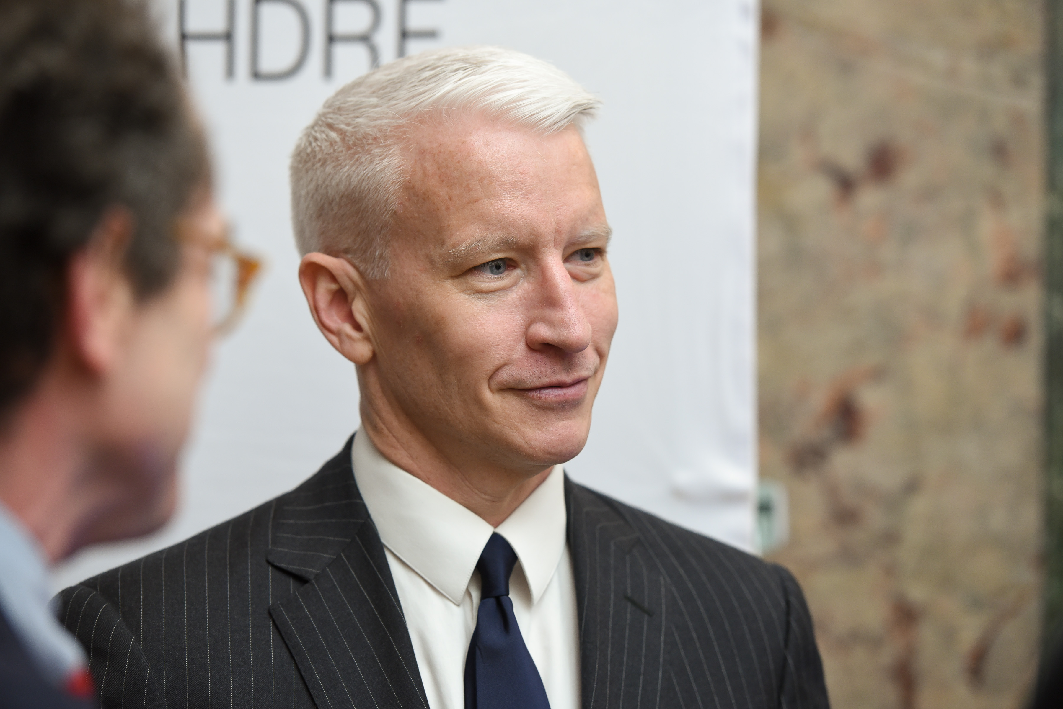 Anderson Cooper smiles