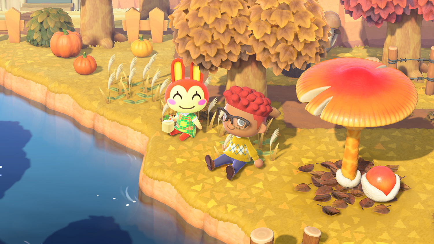 'Animal Crossing: New Horizons' characters sit together in the fall