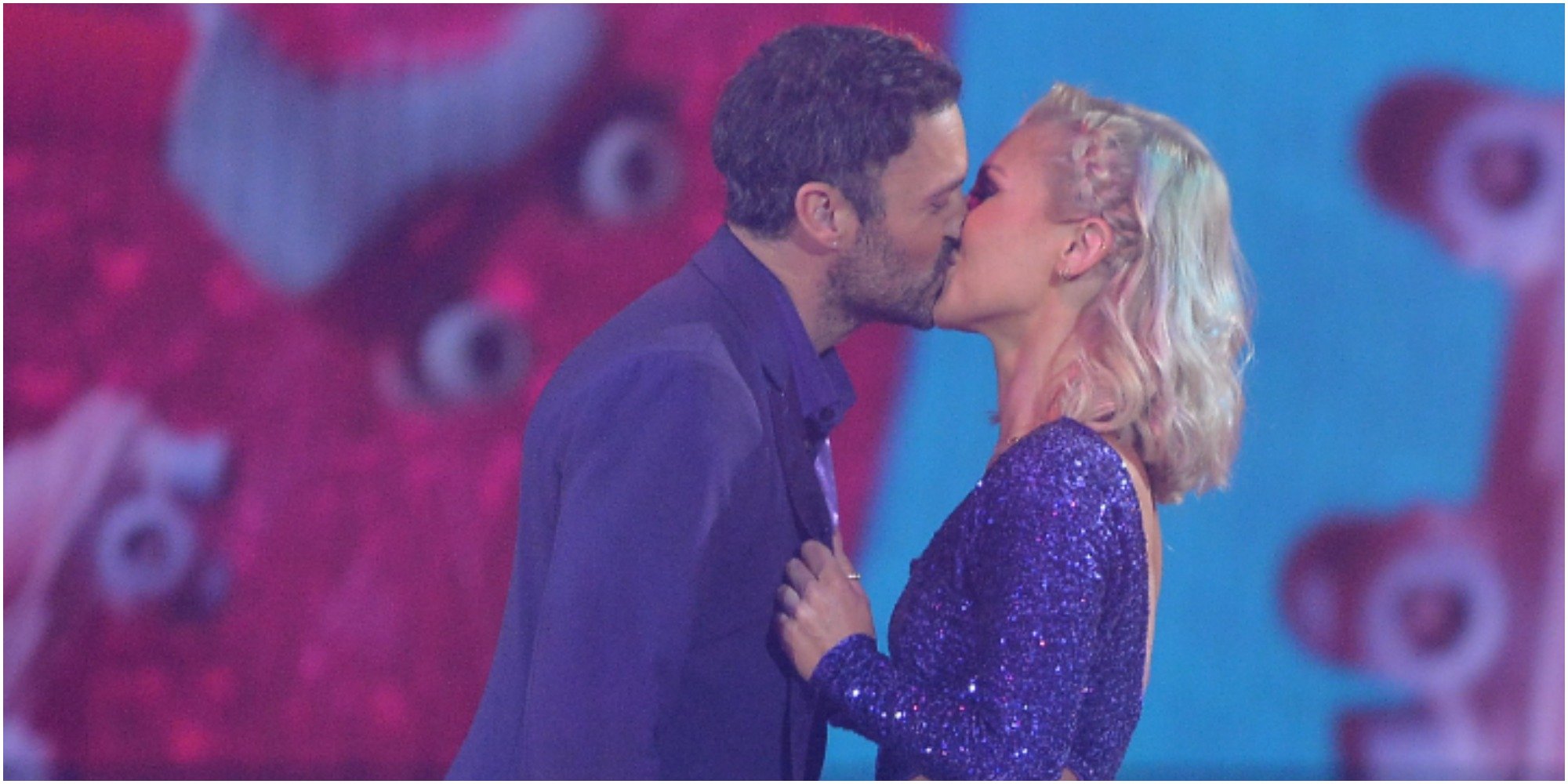 Brian Austin Green and Sharna Burgess share a smooch. The couple will dance to "theri son" for their rhumba.