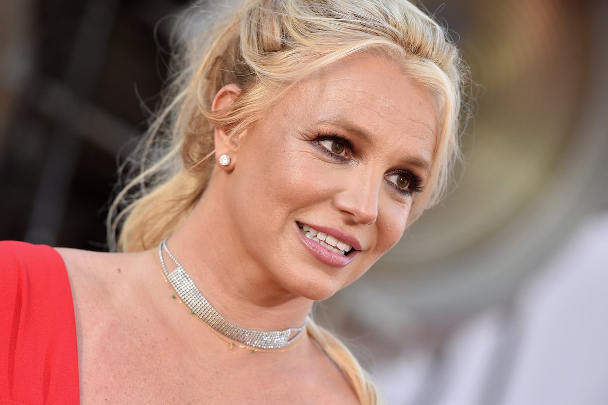 Britney Spears smiling in red dress