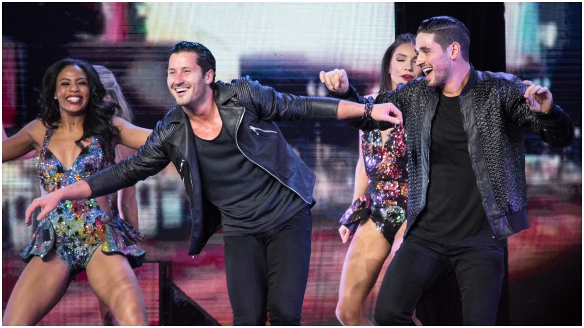 DWTS pros Britt Stweart, Jenna Johnson, Val Chmerkovskiy, Alan Bernsten perform on stage.
