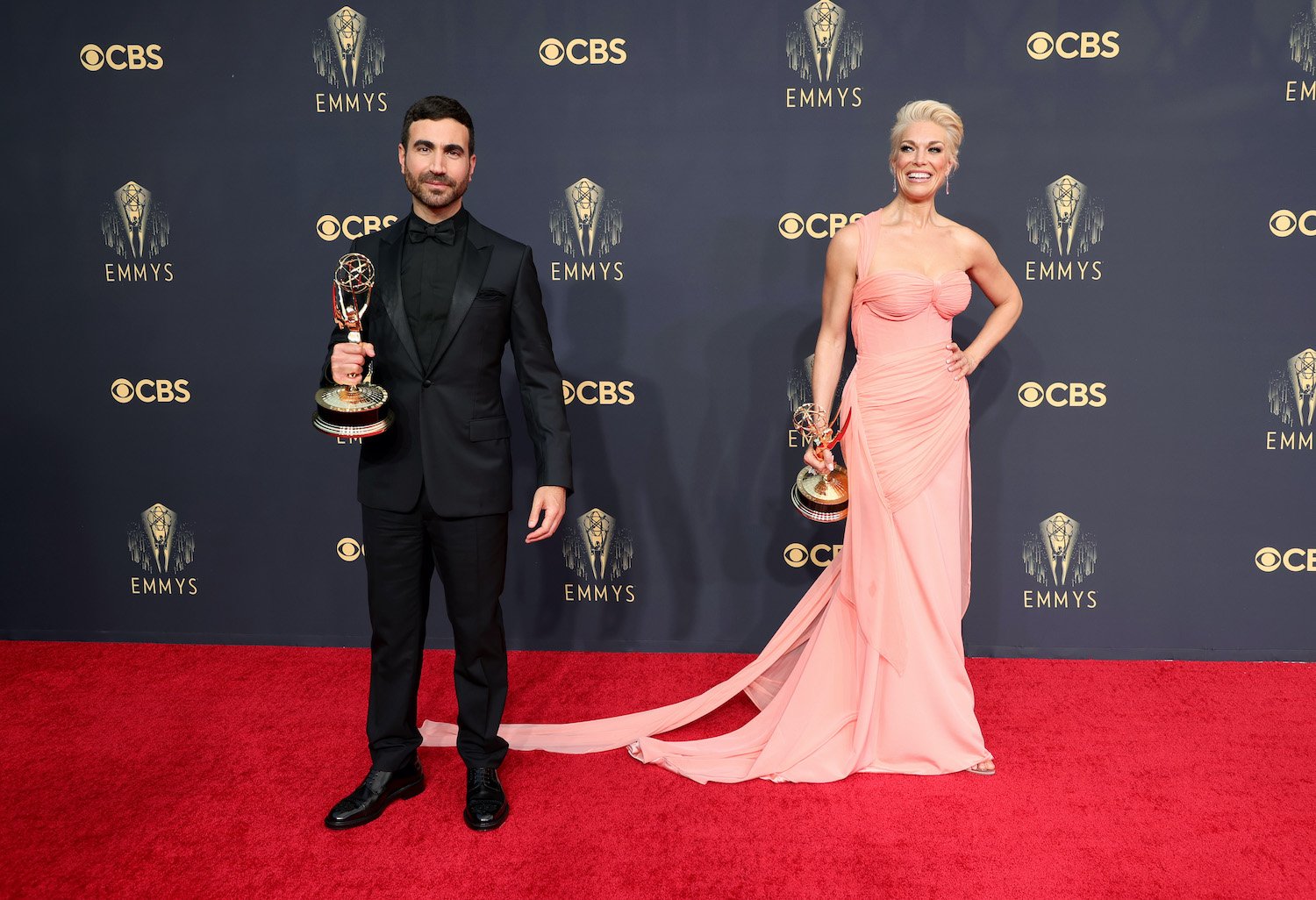 Brett Goldstein, winner of the Outstanding Supporting Actor in a Comedy Series award for ‘Ted Lasso,’ and Hannah Waddingham, winner of the Outstanding Supporting Actress in a Comedy Series on the red carpet of the 2021 Emmys