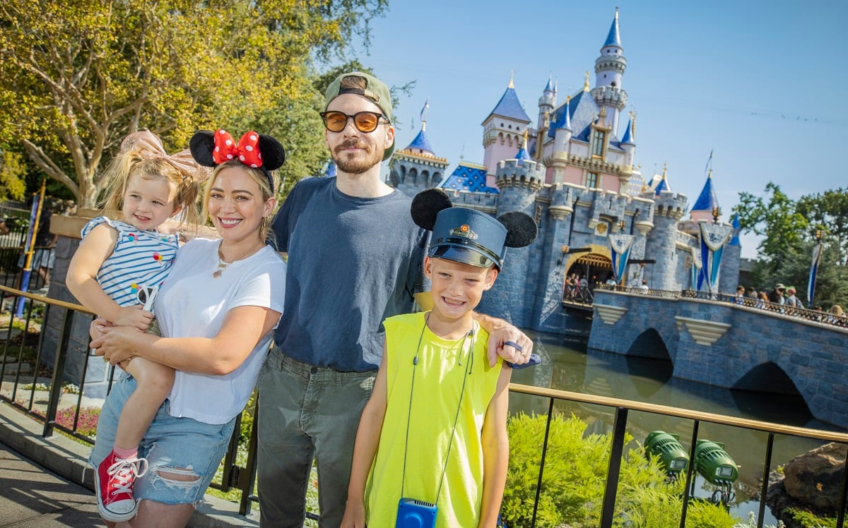 Hilary Duff with her husband, Matthew Koma, their daughter Banks (L) and Duff's son Luca (R) at Disneyland Park on July 23, 2021, in Anaheim, California. 