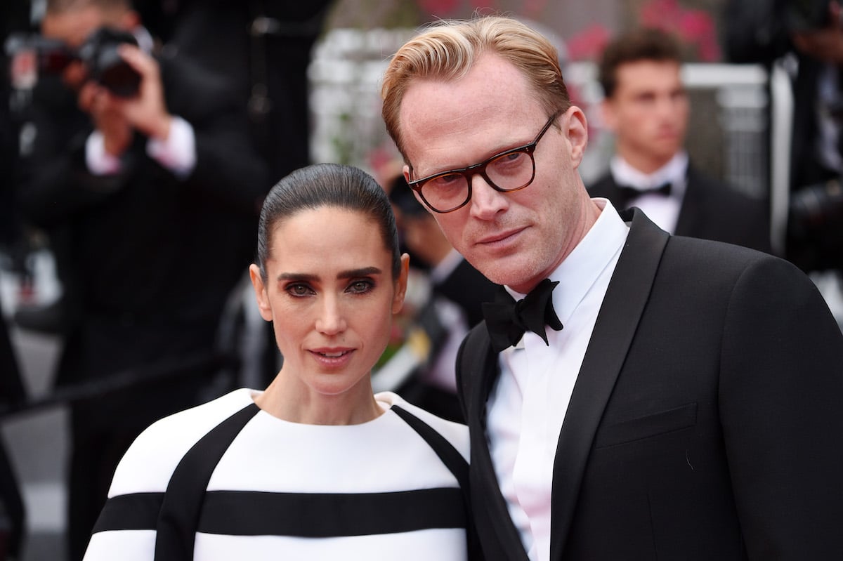 Jennifer Connelly and Paul Bettany posing together in formal attire
