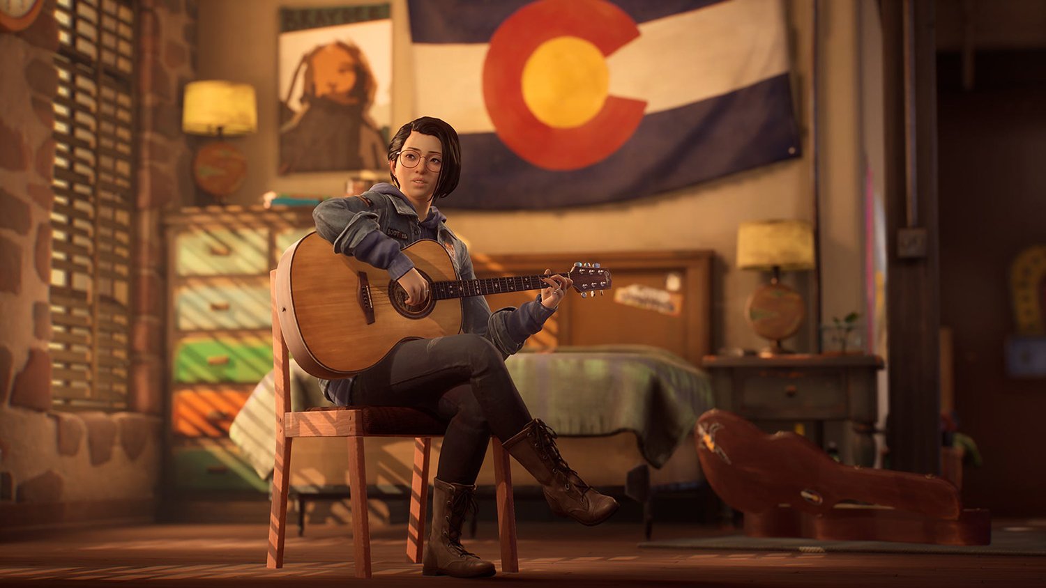 Life is Strange: True Colors character Alex sits with a guitar