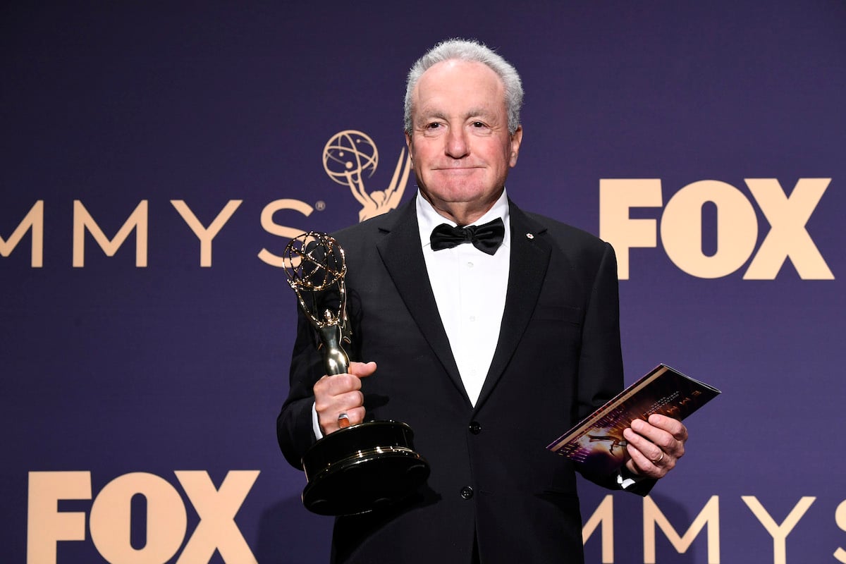 Lorne Michaels in a tuxedo holding an Emmy statue at the 71st annual Emmy Awards.