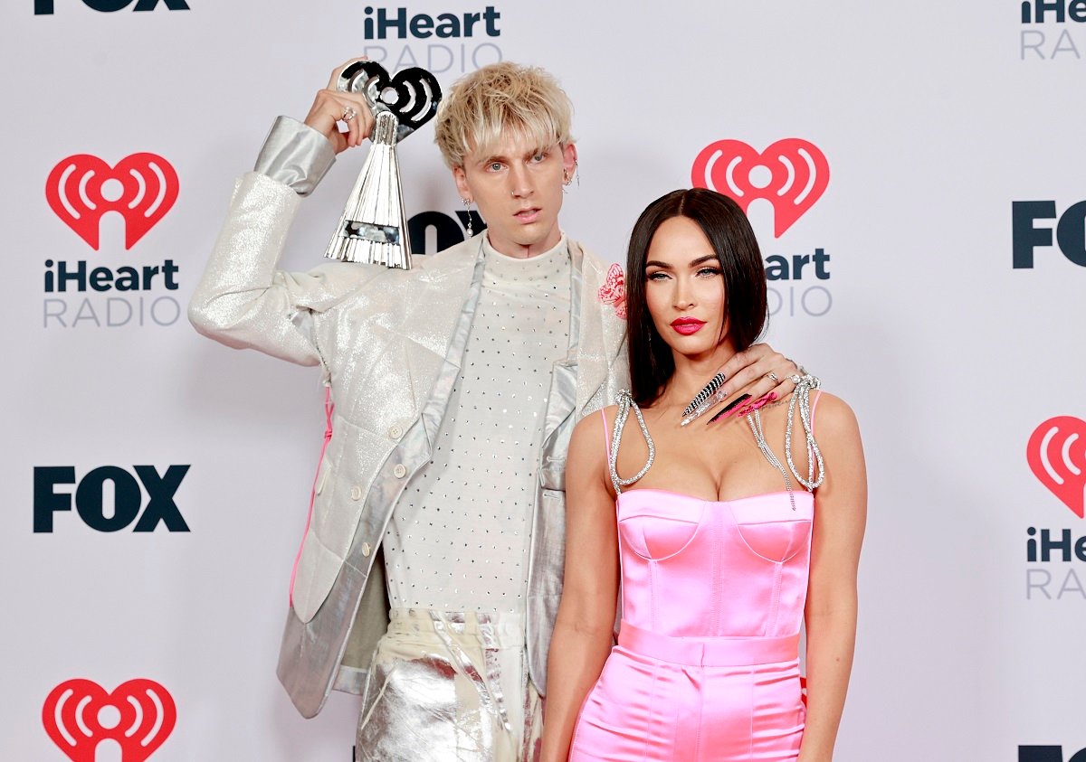 (L-R) Machine Gun Kelly and Megan Fox attend the 2021 iHeartRadio Music Awards in Los Angeles, California.
